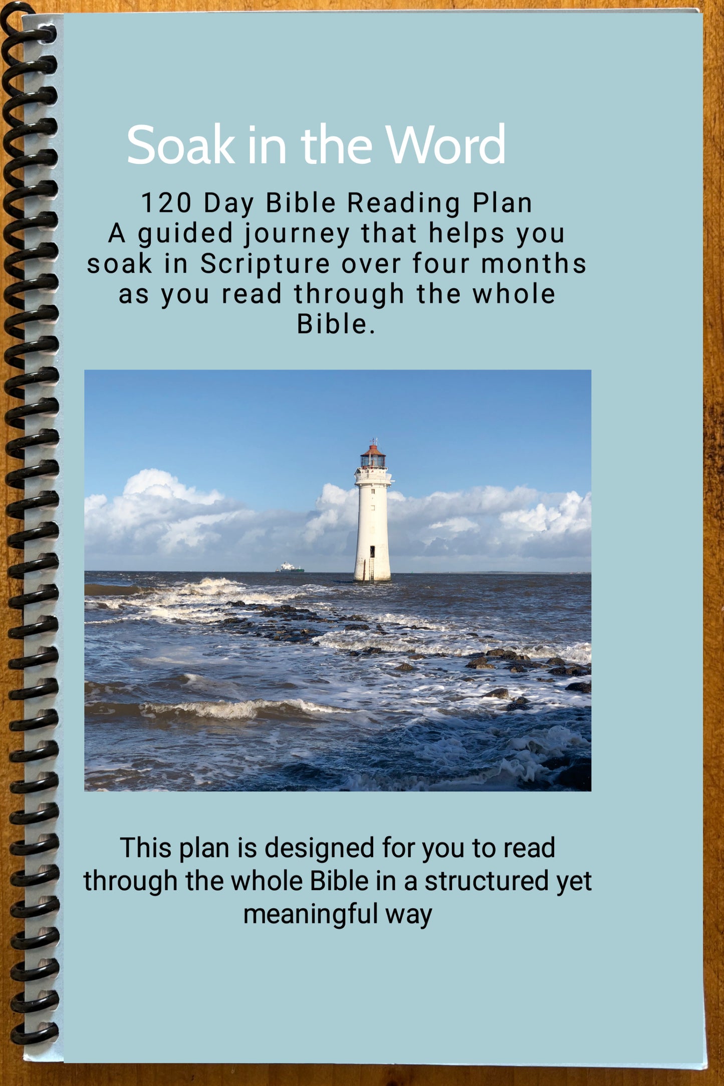 Book cover with a lighthouse image and text about a 120 Day Bible Reading Plan.